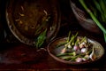 with garlic in the style of Dutch artists. Garlic cloves lie on a bowl painted with oriental-style ornaments. The bowl Royalty Free Stock Photo