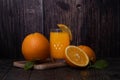 Still life of a glass of fresh orange juice on a vintage wooden table with copy space background Royalty Free Stock Photo