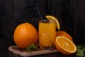 Still life of a glass of fresh orange juice on a vintage wooden table with copy space background Royalty Free Stock Photo