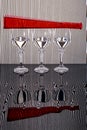 Still life with glass goblets and colored bottles Royalty Free Stock Photo