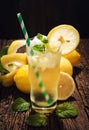 Still Life Glass of Lemonade Soft Drink Lemon Juice on Wooden Table R Royalty Free Stock Photo