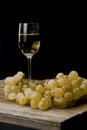 Still life with golden grapes and and white wine Royalty Free Stock Photo