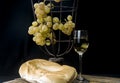 Still life with golden grapes and and bread Royalty Free Stock Photo