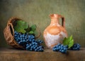 Still life with grapes on a basket Royalty Free Stock Photo