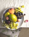 still life and grapes, lychee, mango, pear, peach and plum. Royalty Free Stock Photo