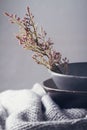 Still life gray vintage bowls with flowers