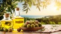 Still life with green olives, olive oil, olive branch, and linen napkin on kitchen table Royalty Free Stock Photo