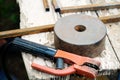 Still life with grindstone and welding holder Royalty Free Stock Photo