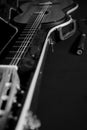 Still life with a guitar in a case and a dynamic microphone in black and white Royalty Free Stock Photo