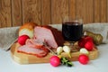 Still life with ham, a glass of wine and a lantern Royalty Free Stock Photo