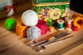 Still life with hobby things: various balls of yarn, crochet hook, scissors Royalty Free Stock Photo