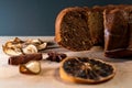 Still life with homemade cake, jar with honey and dipper, cinnamon, dried fruits, star anise on a wooden board. Small Royalty Free Stock Photo