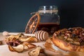 Still life with homemade organic food. Pear pie, jar with honey and dipper, cinnamon, dried fruits, nuts. Healthy Royalty Free Stock Photo