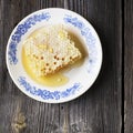 Still life with honey, honeycomb, pollen Royalty Free Stock Photo