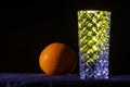 Still life images include: an orange, a vase of a flower 4