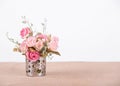 Still life interior decoration pink rose flower on rustic wooden Royalty Free Stock Photo