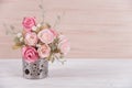 still life interior decoration pink rose flower in a vase on rustic wooden table background.. Royalty Free Stock Photo