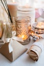 Still life with interior details and burning candles in the living room, the concept of home comfort and interior, romantic gift Royalty Free Stock Photo