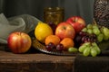 Still life with a jug of wine and fruits. Royalty Free Stock Photo