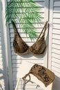 Still life: khaki swimsuit drying in the sunlight