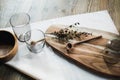 Still life, kitchen table, wooden board, vase, honey Royalty Free Stock Photo