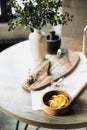 Still life, kitchen table, wooden board, vase, honey Royalty Free Stock Photo