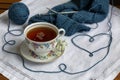 Still life with knitting and cup of tea Royalty Free Stock Photo