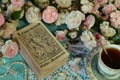 Still life with Lenormand tarot cards, roses and cup Royalty Free Stock Photo