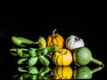 Still life lightpaint color-full little pumpkins and banana