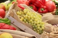 Still life with lots of fruit and a cluster of green grapes, outdoor shot Royalty Free Stock Photo