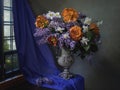 Still life with a luxurious bouquet in a vintage vase Royalty Free Stock Photo