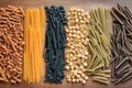 Still life with many different types of pasta. Pasta made from durum wheat of different colors and sizes. Large selection of pasta Royalty Free Stock Photo