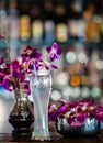 Still life with margarita cocktail and orchid flowers in the bar Royalty Free Stock Photo