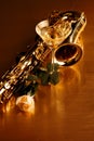 Still Life with a martini, saxophone and white rose Royalty Free Stock Photo