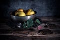 Still life with melchior bowl, apples and vintage cutlery