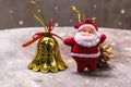 Still life with Merry christmas santa claus bell with snow Royalty Free Stock Photo