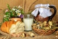 still life with milk and bread and eggs and flowers o Royalty Free Stock Photo