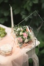 Still life morning of the bride, a dish with a cup of tea, a jewelry box, wedding rings and a bouquet of flowers. Royalty Free Stock Photo