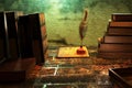 Still life with old books and feather pen on wooden table. 3D render illustration. Royalty Free Stock Photo