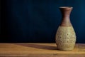 Still life old clay jar on wood Royalty Free Stock Photo