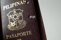 A still life of a old hole-ridden philippine passport Royalty Free Stock Photo