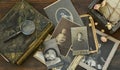 Still-life with old photo album and historical photos of family. Royalty Free Stock Photo