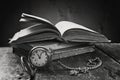 Still life with old pocket watch and books. Royalty Free Stock Photo