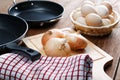 Still-life with onion pans and eggs Royalty Free Stock Photo