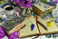 Still life with open diary, coffee cup and bunch of primrose wildflowers on old wooden table Royalty Free Stock Photo