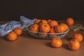 Still life orange in the basket on the black background. food and fruit abstract. Royalty Free Stock Photo
