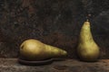 Still life pear- rusty metal background Royalty Free Stock Photo