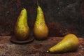 Still life pear- rusty metal background Royalty Free Stock Photo