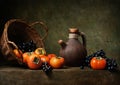 Still life with persimmons on the table Royalty Free Stock Photo