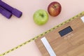 Still Life photography with apples, weight tape measure and a scale Royalty Free Stock Photo